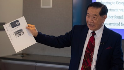 Dr. Henry Lee presents a slideshow at a news conference at the University of New Haven on Thursday, July 11, 2019 in West Haven, Conn.