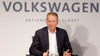 Volkswagen CEO Herbert Diess speaks during a news conference in New York, Friday, July 12, 2019.