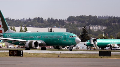 In this May 8, 2019, file photo, a Boeing 737 Max 8 on the runway in Renton, Wash.