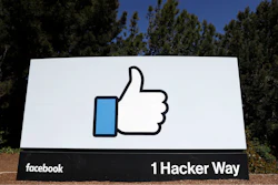 This March 28, 2018, file photo shows the Facebook logo at the company's headquarters in Menlo Park, Calif.