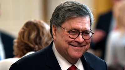 In this April 1, 2019, file photo, Attorney General William Barr attends the 2019 Prison Reform Summit and First Step Act Celebration in the East Room of the White House.