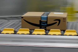 In this Feb. 9, 2018, file photo, a box for an Amazon prime customer moves through the new Amazon Fulfillment Center in Sacramento, Calif.