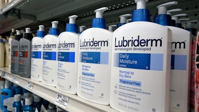 This Nov. 14, 2018, file photo shows Lubriderm, a Johnson & Johnson product, on display at a market in Pittsburgh.