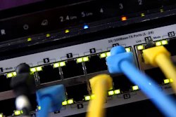 In this June 19, 2018, file photo, a router and internet switch are displayed in East Derry, N.H.