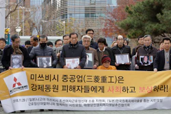 In this Nov. 29, 2018, file photo, victims of Japan's forced labor and their family members arrive at the Supreme Court in Seoul.