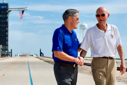 In this Tuesday, July 16, 2019, photo, astronaut Michael Collins, right, speaks to Kennedy Space Center Director Bob Cabana at Launch Complex 39A.