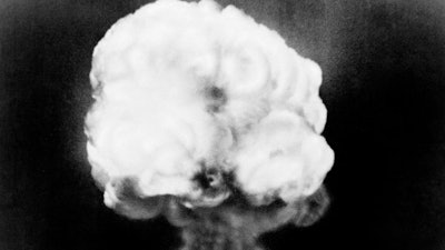 This July 16, 1945, file photo, shows the mushroom cloud of the first atomic explosion at Trinity Test Site near Alamagordo, N.M. A compensation program for those exposed to radiation from years of nuclear weapons testing and uranium mining would be expanded under legislation that seeks to address fallout across the western United States, Guam and the Northern Mariana Islands.