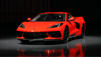 This June 24, 2019, photo shows a pre-production 2020 Chevrolet Corvette automobile in Warren, Mich. The mid-engine C8, the flagship of GM's Chevrolet brand, will have the weight balance and center of gravity of a race car, rivaling European counterparts and leaving behind sports sedans and ever-more-powerful muscle cars that were getting close to outperforming the current 'Vette.