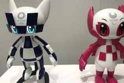 In this Thursday, July 18, 2019, photo, robots of mascots of Olympics 'Miraitowa,' left, and Paralympics 'Someity' are shown to the media at Toyota Motor Corp. headquarters in Tokyo.
