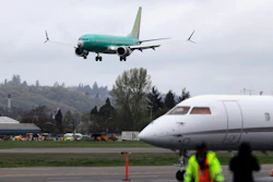 In this April 10, 2019, file photo, a Boeing 737 MAX 8 airplane lands following a test flight in Seattle.