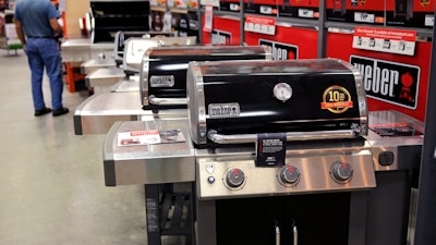 In this July 11, 2019, photo, Weber grills are displayed at the Home Depot store in Londonderry, N.H.