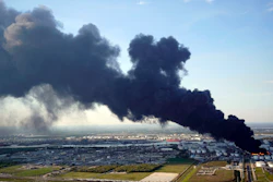 In this March 18, 2019, file photo, a plume of smoke rises from a petrochemical fire at the Intercontinental Terminals Company in Deer Park, Texas.