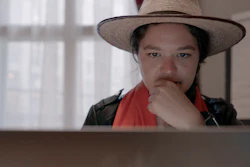 This image released by Netflix shows Brittany Kaiser, former Director of Business Development for Cambridge Analytica, in a scene from 'The Great Hack.'