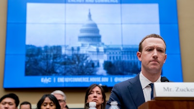In this April 11, 2018, file photo, Facebook CEO Mark Zuckerberg pauses while testifying before a House Energy and Commerce hearing on Capitol Hill.