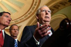 Senate Majority Leader Mitch McConnell speaks to reporters following the weekly policy lunches on Capitol Hill, Tuesday, July 23, 2019.