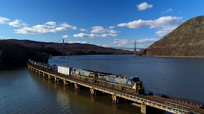 In this April 26, 2018, file photo, a CSX Transportation locomotive pulls a train of tank cars across a bridge near Fort Montgomery, N.Y.