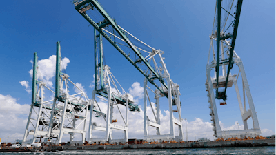 In this Wednesday, July 24, 2019 photo, large cranes to unload container ships are shown in Miami.