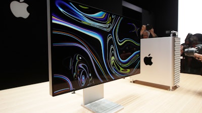 In this June 3, 2019, file photo, a monitor of the Mac Pro is shown in the display room at the Apple Worldwide Developers Conference in San Jose, Calif.