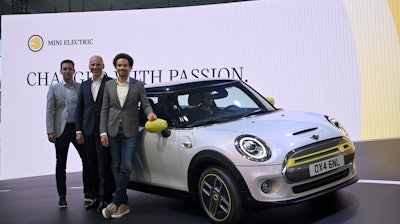 Mini Senior Vice President Bernd Koerber (left), BMW Board of Management member Pieter Nota (center), and Mini design vice president Oliver Heilmer in Rotterdam, July 9, 2019.