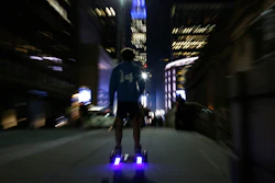 In this Oct. 21, 2015 file photo, a young man rides a hoverboard along a Manhattan street toward the Empire State Building, in New York. A Tennessee family's lawsuit against online retailer Amazon over a hoverboard fire that destroyed their home can move forward. The 6th U.S. Circuit Court of Appeals in a Friday, July 9, 2019, ruling said Amazon was aware of complaints about hoverboards catching fire and exploding. The Seattle-based company even launched an investigation that led to its ceasing all hoverboard sales worldwide.