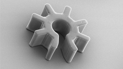 Scanning electron microscopy image of a 'cogwheel-shaped' optoelectronic microrobot. A mammalian cell or another sub-mm payload is scooped up into the central chamber of the robot, which is then manipulated away from the bulk suspension for analysis.
