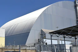This June 1, 2019, file photo shows a view of the New Safe Confinement (NSC) movable enclosure at the nuclear power plant in Chernobyl, Ukraine. A new structure built to confine the Chernobyl nuclear reactor at the center of the world's worst nuclear disaster has been previewed for the media.