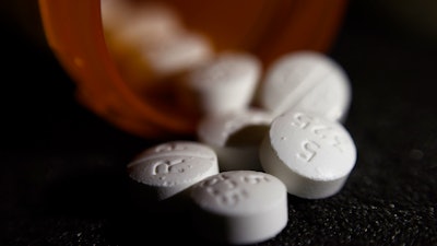 This Tuesday, Aug. 15, 2017, file photo shows an arrangement of pills of the opioid oxycodone-acetaminophen in New York. Newly released federal data shows how drugmakers and distributors increased shipments of opioid painkillers across the U.S. as the nation’s addiction crisis accelerated from 2006 to 2012.