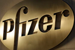 In this Nov. 23, 2015, file photo, the Pfizer logo is displayed at world headquarters in New York. Pfizer is buying Mylan in an all-stock deal and combining the generic pharmaceutical company with its off-patent branded and generic established medicines business.