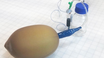 The simple DIY pump made from a balloon and stockings.