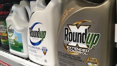 In this Feb. 24, 2019, file photo, containers of Roundup are displayed on a store shelf in San Francisco. A Northern California judge has upheld a jury's verdict that Monsanto's Roundup herbicide caused cancer in a couple but reduced damages from $2 billion to $86.7 million.