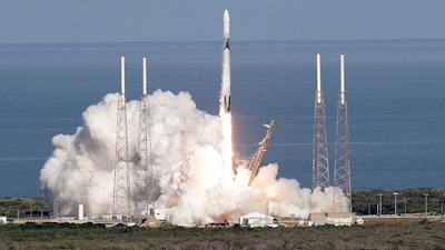 A Falcon 9 SpaceX rocket with a resupply mission to the International Space Station lifts off from pad 40 at the Cape Canaveral Air Force Station in Cape Canaveral, Fla., Thursday, July 25, 2019.