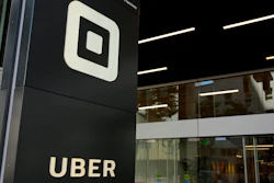 This June 21, 2017, file photo shows the building that houses the headquarters of Uber, in San Francisco. Uber is laying off 400 employees in marketing, about a quarter of the marketing team's global workforce of 1,200 people. The move, announced Monday, July 29, 2019, follows a leadership shake-up in June when CEO Dara Khosrowshahi combined the company's marketing, communications and policy teams.