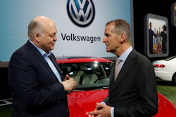 In this Jan. 14, 2019, file photo Ford Motor Co. President and CEO, Jim Hackett, left, meets with Dr. Herbert Diess, CEO of Volkswagen AG, at the North American International Auto Show in Detroit. Ford and Volkswagen are planning to unveil details about their budding alliance to build mobility services and autonomous and electric vehicles. Executives from both companies are planning to reveal details Friday, July 12.