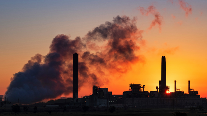 In this July 27, 2018, file photo, the Dave Johnson coal-fired power plant is silhouetted against the morning sun in Glenrock, Wyo.