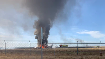 In this photo provided by the California Highway Patrol is the scene where a jet burst into flames after aborting a takeoff Wednesday, Aug. 21, 2019, in Oroville, Calif. Officials say a small jet burst into flames while trying to take off from a small Northern California airport, but all 10 people on board escaped injury. The Federal Aviation Administration says the pilot of the twin-engine Cessna Citation jet aborted its takeoff at Oroville Municipal Airport for unknown reasons shortly before noon Wednesday. The aircraft slid off the end of the runway into the grass and caught fire. The plane was flying from Oroville to Portland International Airport in Oregon.