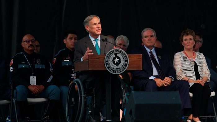 Gov. Greg Abbott speaks during a memorial service for the victims of the Aug. 3 mass shooting, Wednesday, Aug. 14, 2019, at Southwest University Park in El Paso.