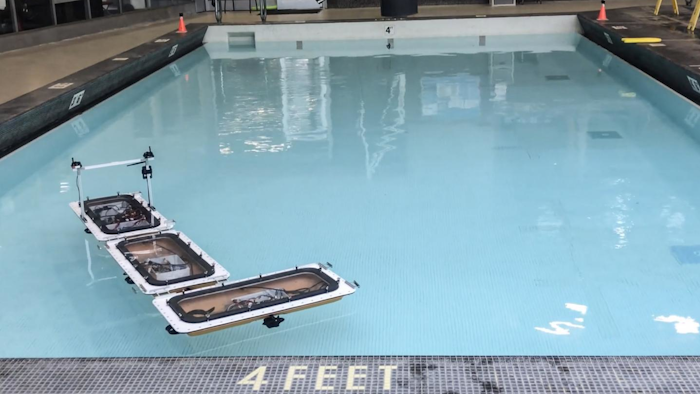 MIT's fleet of robotic boats has been updated with new capabilities to 'shapeshift,' by autonomously disconnecting and reassembling into different configurations to form various floating platforms in the canals of Amsterdam. In experiments in a pool, the boats rearranged themselves from a connected straight line into an 'L' (shown here) and other shapes.