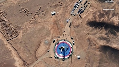 Satellite image provided by DigitalGlobe shows a missile on a launch pad at the Imam Khomeini Space Center, Feb. 5, 2019.