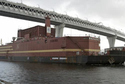 The floating nuclear power plant Akademik Lomonosov is towed out of the shipyard where it was constructed in St. Petersburg, Russia, April 28, 2018.