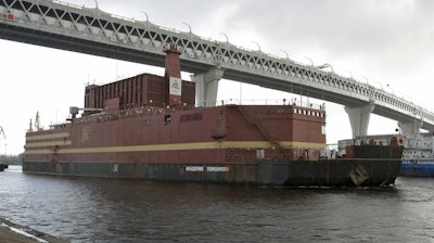 The floating nuclear power plant Akademik Lomonosov is towed out of the shipyard where it was constructed in St. Petersburg, Russia, April 28, 2018.