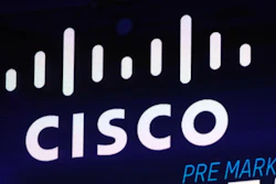 In this Oct. 3, 2018, file photo, the Cisco logo appears on a screen at the Nasdaq MarketSite in New York's Times Square.