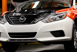 In this April 6, 2016, file photo, a new 2016 Altima awaits additional engine work on the assembly line at the Nissan Canton Vehicle Assembly Plant in Canton, Miss.