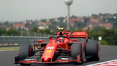 Ferrari driver Charles Leclerc of Monaco steers his car during the first practice session of the Hungarian Formula One Grand Prix at Hungaroring racetrack in Mogyorod, northeast of Budapest, Friday, Aug. 2, 2019.