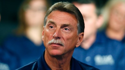 This July 14, 2015, file photo shows Norwood Jewell, vice president of the Fiat Chrysler Automobiles US Department, United Auto Workers, during the opening of contract negotiations in Detroit.