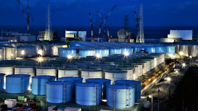 This Jan. 25, 2019, photo shows water tanks containing contaminated water that has been treated at the Fukushima Dai-ichi nuclear plant in Okuma, Japan.