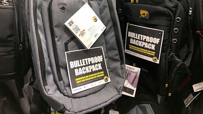 This Thursday, Aug. 8, 2019 photo shows bulletproof backpacks that for sale at an Office Depot store in Evanston, Ill.. With the rise of mass shooting, companies like Guard Dog Security, TuffyPacks and Bulletblocker are creating bullet-resistant backpacks for children for the back-to-school shopping season. Many say they’re seeing an increase in sales in their products leading up to the fall, and typically see a spike in sales after a mass shooting.