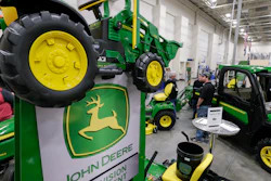 In this Feb. 23, 2018, file photo, John Deere products on display at a home and garden trade show in Council Bluffs, Iowa.