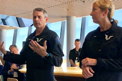 Virgin Galactic pilots Mark 'Forger' Stucky and Kelly Latimer discuss their morning test flight at Spaceport America near Upham, N.M., Thursday, Aug. 15, 2019.