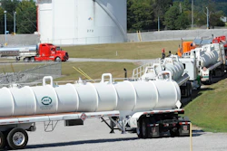 This Sept. 16, 2016, file photo shows tanker trucks lined up at a Colonial Pipeline Co. facility in Pelham, Ala.