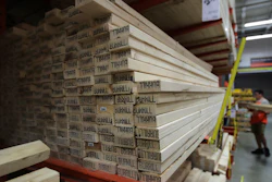 In this July 11, 2019, file photo, lumber is stacked at the Home Depot store in Londonderry, N.H.